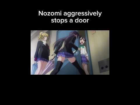 Nozomi Tojo aggressively stops a door (Love Live! School Idol Project)