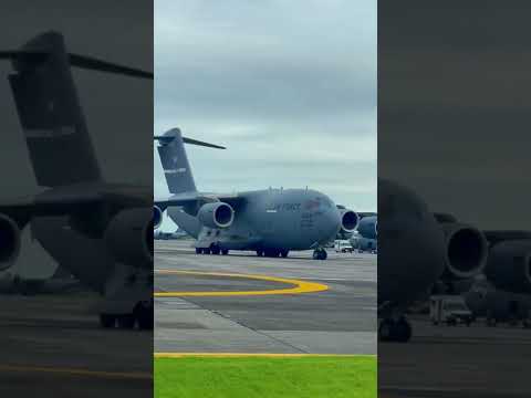 Yokota Airlift Hub: USAF C-17 Globemaster III taxing down the flightline