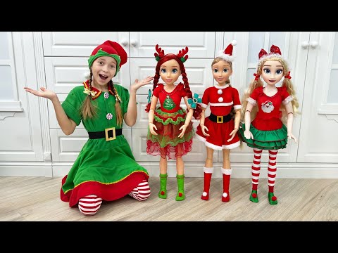 Sofia sews Christmas costumes for Princesses Doll!