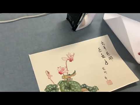 Dry mounting a gongbi painting on cicada wing rice paper with silicon