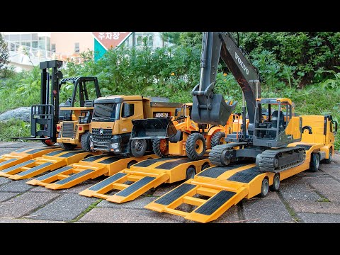 Let’s move various types of RC heavy equipment on the trailer one by one