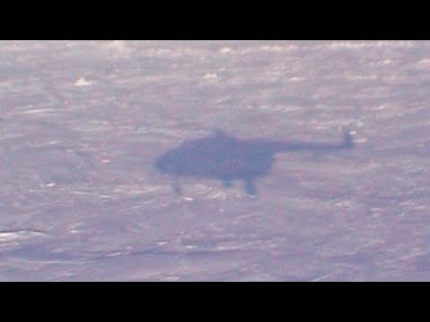 Landing of the helicopter in the Arctic Ocean - Geographic North Pole 2002 expedition