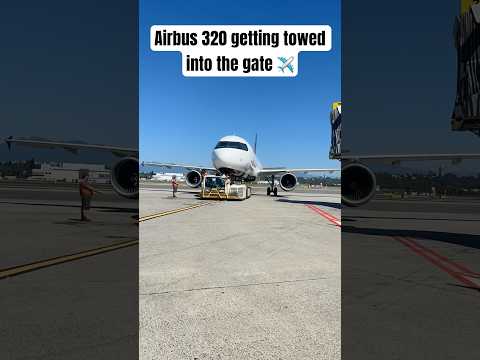 Airbus 320 getting towed into the gate ✈️ #aviation #travel