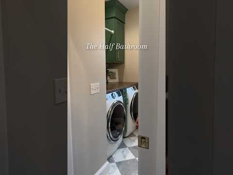 The half bathroom: also the laundry, a clean, nature-inspired green and gold design mix #powderroom