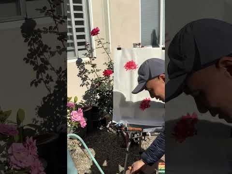 Henry painting the Last Roses of 2022 in his back yard