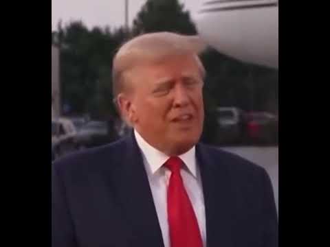 Donald Trump speaks with reporters after getting arrested in Fulton county, Georgia.