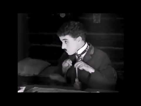 Charlie Chaplin, cena do filme de 1925 "Em Busca do Ouro" ,  com música adaptada  "Billie Jean"