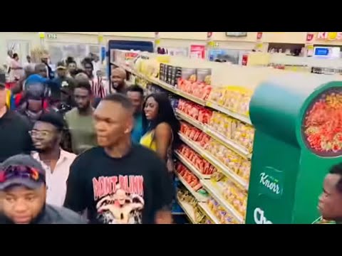 The Moment Nigerian/American Boxer Israel Adesanya Stormed Shoprite Ikeja Lagos