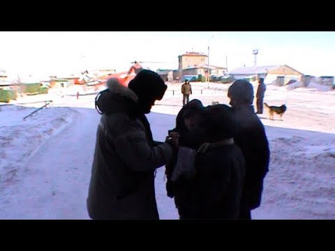 Buying handicrafts to Khatanga children - Geographic North Pole 2002 expedition