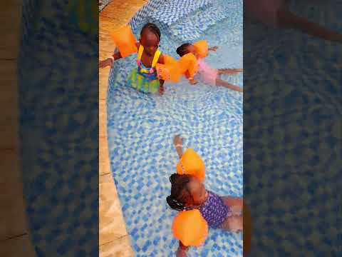 My 2 years old first time in a swimming pool  / Baby's first time swimming / children's playground