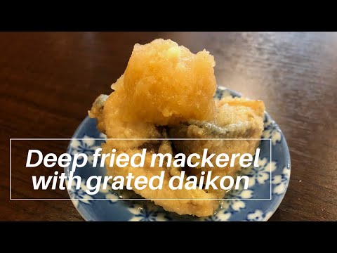 Japanese chef cooks deep fried mackerel with grated daikon (Mizoreni)